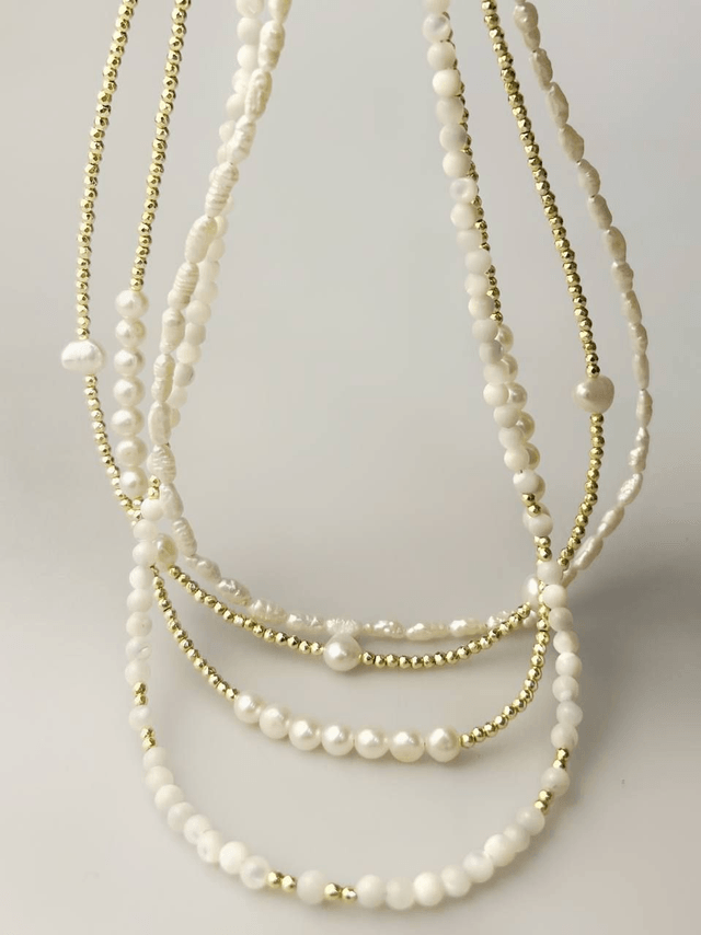 Collana Figli del Sole in Ematite Dorata e Perle